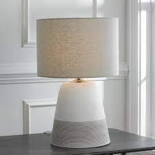 This table lamp not only lightens up your space with a delicate and ambient tone but also adds a quirky and artistic character to your interior. Grooved Concrete Table Lamp Small Concrete Table Lamp Contemporary Table Lamps Lamps Living Room