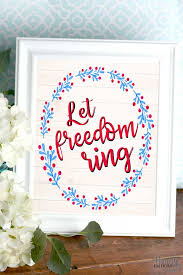 Hanging this pallet sign proudly in your home shows true patriotism. How To Add Patriotic Farmhouse Decor To Your Home With A Free Printable