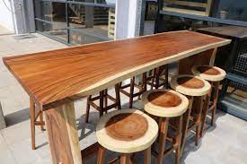 Redefine your dining experience with elegant wood table top at alibaba.com. Contemporary High Bar Table Suar Unik Walnut Exotic Wood Rectangular