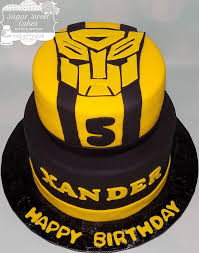 A transformers bumblebee car cake for a customer's little man's 5th birthday complete with edible handpainted transformers sign and a happy birthday sign painted in the style of the transformers dark of the. Collections Of Bumblebee Transformer Birthday Cake