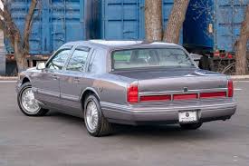 Image result for Electric Current Red 1995 Town Car