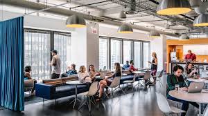 Eames In This Office Employees Work And Talk In A Communal Environment With Various Seatin Office Interior Design Interior Design Inspiration Office Interiors