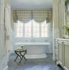 Windows are one of the most important features of any room, so it's no surprise that window treatments play a very essential role in a room's overall design. 7 Bathroom Window Treatment Ideas For Bathrooms Blindsgalore