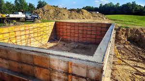 The concrete basement floor is poured, leveled, and screeded. Forming The Basement Walls Youtube