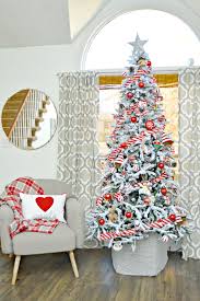 Christmas candy treats with a pile of traditional red and white striped candy canes on a dark background, viewed from above. Red And White Candy Cane Themed Flocked Christmas Tree Mom 4 Real
