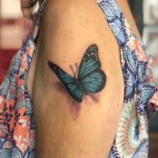 The first is a blue butterfly on the right side of her lower back. Traditional Blue Butterfly Tattoo Novocom Top