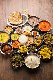 Indian Assorted Vegetarian Food In Plate And Serving Bowls Indian Food Recipes Traditional Indian Food Indian Food Photography