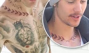 Justin Bieber Reveals Yet Another New Tattoo A Large Laurel Wreath On His Collarbone Daily Mail Online Don't ever let anyone tell you that in order to be beautiful, you need to. large laurel wreath on his collarbone