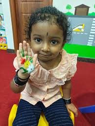 Hand painting activity at school