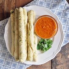 Homemade Garlic Breadsticks With Mojo Picon Sauce Spain On A Fork Recipe Garlic Breadsticks Breadsticks Baking Bread Recipes