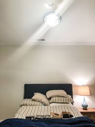 It looks like a light bulb is installed into an empty can, which gets inserted into the open hollow in the ceiling. How To Brighten A Room Bower Power