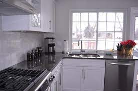 Steel gray granite can be used to create contrast in your kitchen or bathroom. Steel Gray Granite Contemporary Kitchen Grey Granite Countertops Kitchen Cabinets Grey And White Grey Countertops
