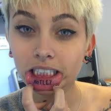 Lips with skull and crossbones tattoo. 60 Lip Tattoos Ideas For Women Kiss Tattoos