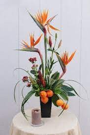 Maybe you would like to learn more about one of these? Love Birds In Paradise In Palo Alto Ca Stanford Floral Design Tropical Flower Arrangements Tropical Floral Arrangements Flower Decorations