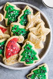 We decorated the cookies with white, red and green coarse sanding sugar, sometimes called pearlized sugar, but you can feel free to swap in plain. Gluten Free Sugar Cookies With Easy Icing Snixy Kitchen