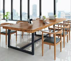 A sturdy crafted glass tabletop and lower shelf serve as convenient storage spaces for books,. China Nature Solid Wood Top Table And Metal Legs Simple Design Solid Timber Table Wood Natual Wood Table China Solid Timber Dining Table Furniture
