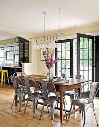 Classic Farmhouse Table Mixed With Industrial Modern Chairs Great Eclectic Look For Your Kitchen Dining Room Decor Country Modern Dining Room Farmhouse Dining