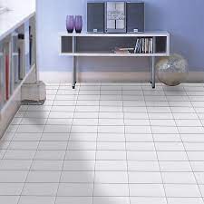 When you purchase your tiles, ask the dealer or assistant about the types of ceramic floor tile adhesive that they recommend. B Q White Marble Effect Self Adhesive Vinyl Tile 1 02m Pack Diy At B Q