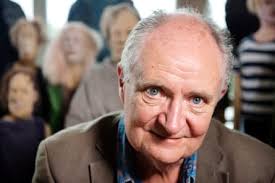 Meet the family: Jim Broadbent unveils his quirky wooden statues