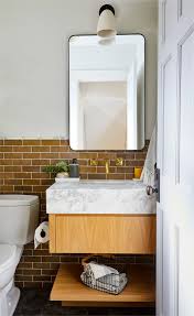 This bathroom sink boasts a matching framed large mirror, a clean white rectangular vanity top and basin to brighten any master bath. Floating Vanity Ideas For A Clean Modern Look Better Homes Gardens