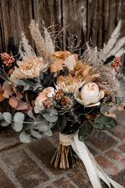 Here, browse 60 gorgeous ideas from real weddings. 35 Rustic Wedding Decorations You Must Have A Look Fall Wedding Bouquets Diy Bridal Bo Unique Wedding Bouquet Bohemian Wedding Bouquet Fall Wedding Bouquets