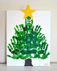 This Handprint Christmas Tree Keepsake On Canvas Is My Absolute Favorite Handprint Craft We V Handprint Christmas Handprint Christmas Tree Christmas Activities