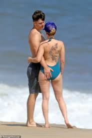 Significantly at whatever point her parts don't oblige them, and she wears more unobtrusive ensembles. Scarlett Johansson Flaunts Her Beach Body And Back Tattoos With Fiance Colin Jost In The Hamptons Daily Mail Online
