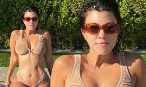 Scott disick not jealous of kourtney kardashian over her relationship with travis barker #scottdisick #kourtneykardashian #travisbarker. Kourtney Kardashian Flashes Her Gym Honed Body In A Plunging Bralette And Matching Thong By The Pool Daily Mail Online