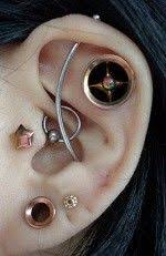 anatometal polaris eyelet 1 2 titanium copper with synthetic opal 32 gems