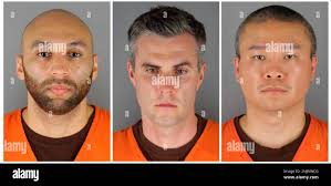 This combo of June 3, 2020 file photos provided by the Hennepin County,  Minn., Sheriff's Office, shows, from left, J. Alexander Kueng, Thomas Lane  and Tou Thao. Former Minneapolis police Officer Thomas