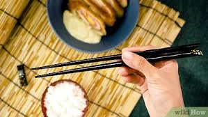 Ensure it is well supported by your small finger and held in place to ensure you are using your chopsticks properly and sticking to chopstick etiquette, bear in mind the following points: 3 Ways To Hold Chopsticks Wikihow