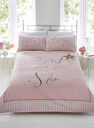 The easy care set features a print of rainbows, flowers and unicorns. Rapport Wish Upon A Star Duvet Cover Bedding Set Pink Gold Bb Textiles Bb Textiles