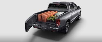 This combination is good for up to 18 mpg in the city and 24 mpg on the highway.</p> 2019 Honda Ridgeline Utility Features Capital Region Honda Dealers