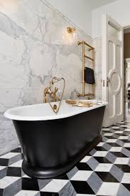 This bathroom decor features a white base with uniquely patterned wall tile that resembles an ultra modern brick design with thin lines. Black And White Bathroom Mood Board Greenhouse Studio