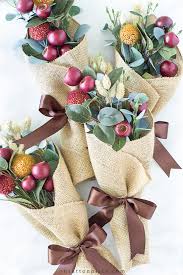 These fun party favors double as halloween decor and give your fete a fun and unexpected twist. Autumn Burlap Bouquet Table Favors On Sutton Place