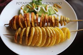 They also go by other names such as chip sticks, spiral spuds, potato springs, twisted tators, saratoga swirls, and just plain tornado potatoes. Potato Spirals Recipe How To Make Tornado Fries At Home Kids Snacks