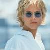 This longer version of her short hairstyle, see photo left, features long stacked layers and a choppy, messy sort of styling. Https Encrypted Tbn0 Gstatic Com Images Q Tbn And9gct5qhdhhuuvmlagibj3urlbsznmrxizrdgbb3onocw9hr Bauwf Usqp Cau