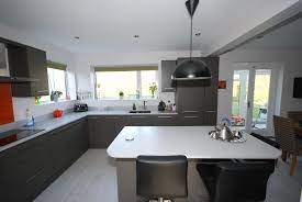 Please speak to us about help with having the kitchen dismantled & delivered. Lava Grey Kitchen With White Mistral Worksurface And Burnt Orange Splashback By Saffron Interiors Lava Gre Kitchen Fittings Kitchen Design Kitchen Projects