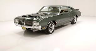 Image result for Scaraba Green 1930 Oldsmobile