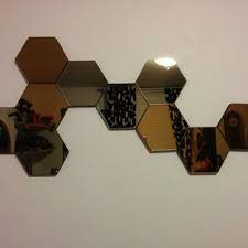 An arrangement of silver and copper hexagon mirrors will make any blank wall stand out. Adding Depth And Swagger To Ikea S Otherwise Flat Hexagonal Honefoss Mirrors 4 Steps With Pictures Instructables