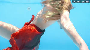 Petite teen Ivi Rein endures the free naked swimming