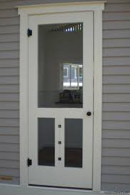 Front door with window and screen. Wood Screen Door With Cutouts In Florida By Historic Shed Wooden Screen Door Vintage Screen Doors Wooden Screen