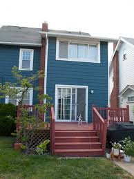 Initially i was all for white trim. Dark Teal House Paint Reveal Before And After And Then We Tried