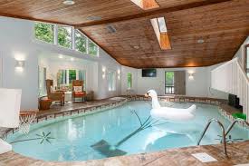 That's a question you may ask. This Muirfield Manor Has A Stunning Staircase A Basketball And An Indoor Pool