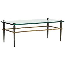 Maison jansen, neoclassical oval brass coffee table with dolphin on center of. Bronze Coffee Table With Glass Or Stone Top For Sale At 1stdibs
