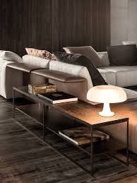 It features a metal frame in your choice of metallic finish with four tapered legs for a sleek design. Calder Bronze Side Tables Coffee Tables En