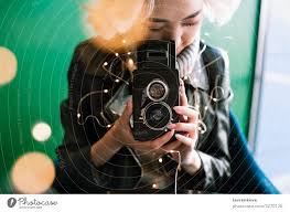 Video atau foto bokeh akan menghasilkan gambar atau video yang fokus pada sebuah objek tertentu. Female Holding Vintage Film Camera With Fairy Lights And Bokeh A Royalty Free Stock Photo From Photocase