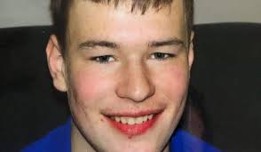 Family of teenager who died this year gather at Derry's City Cemetery to  remember him at Christmas