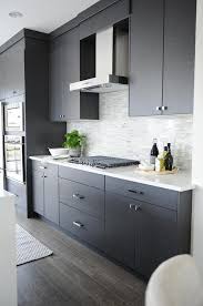 See more kitchen countertop ideas with white cabinets here. Dark Gray Quartz Countertops Design Ideas