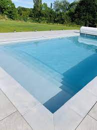 Maybe you would like to learn more about one of these? Terrasse Sur Plots Effet Pierre Autour D Une Piscine Dalle Piscine Plan Piscine Piscine Rectangulaire